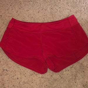 Red Lululemon shorts